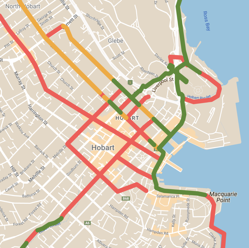 Map showing green, orange and red lines indicating bike paths in the Hobart CBD.